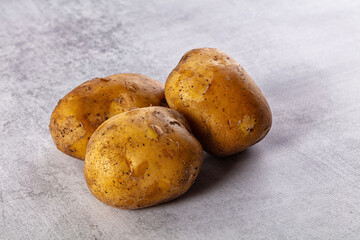 Raw potato heap for cooking