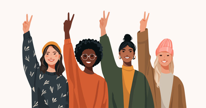 Groupe de femmes diverses levant les doigts en signe de victoire, symbole de paix et d'unit&eacute;.