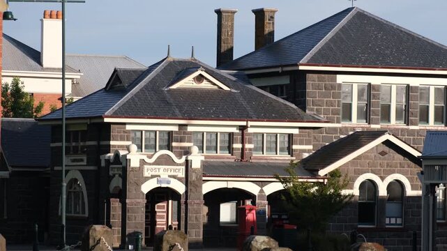 The historic post office building in Camperdown, Victoria, Australia, featuring locally quarried bluestone and classic architectural details. A landmark civic building in the Australian regional town.