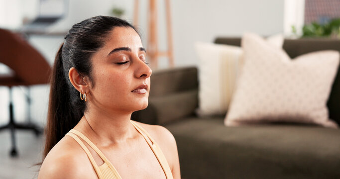 Calm, yoga and woman with meditation in home for stress relief, spiritual healing or holistic wellness. Fitness, yogi or breathing exercise in apartment for inner peace, mindfulness or zen in morning