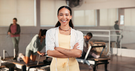 Portrait, woman and arms crossed in class for pilates, fitness pride and personal trainer. Happy,...