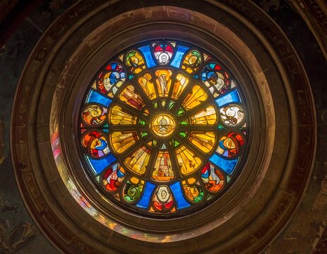 Vibrant Stained Glass Window with Intricate Circular Design. - Powered by Adobe