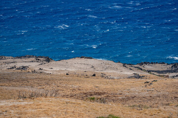 Basalt lava flows. Hana Volcanics ( Basanite of Puu Pane ). Hawaii Route 31 ( Pi'ilani Highway ), Maui, Hawaii. Haleakalā, or the East Maui Volcano, is a massive, active shield volcano.