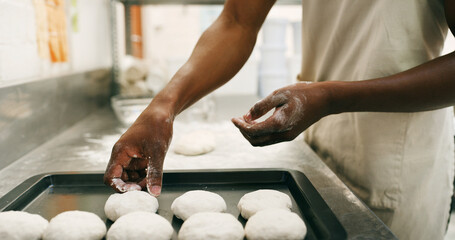 Man, hands and flour in bakery with dough for baking bread, cooking food and restaurant cuisine....