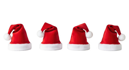 Four festive red santa hats ready for christmas and holiday season