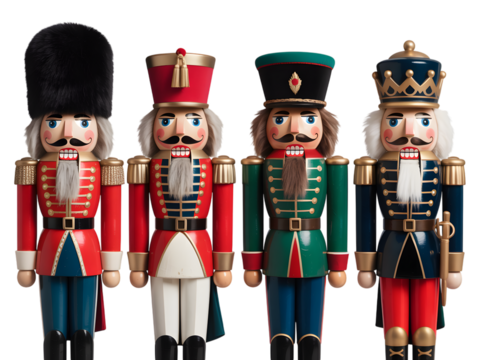 Four traditional wooden nutcracker figures in uniform, isolated on transparent background
