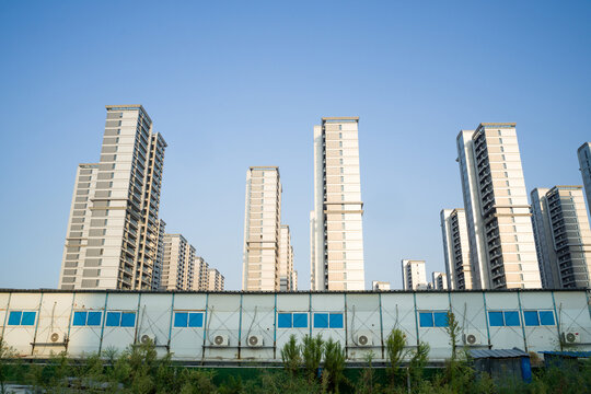 Aerial view of modern high-rise residential - Powered by Adobe