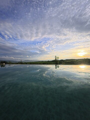 sunset over the pool