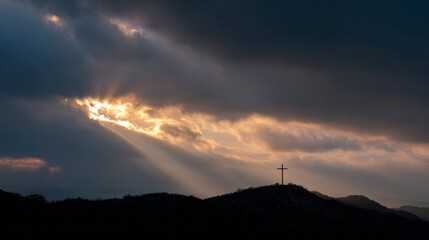 Sunset rays illuminate a solitary hilltop cross, evoking contemplative Easter vigil vibes with whispers of Tynwald Day mystery