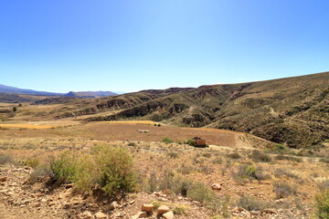 the landscape between Sucre and Potosi near the river Puente Mayu Tambo in Bolivia