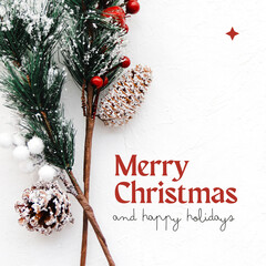 Merry christmas and happy holidays text with pine cones and red berries on a white background