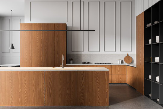 Modern kitchen interior design with wood cabinetry and minimalist white panel walls, featuring open shelving and integrated appliances. 3D Rendering