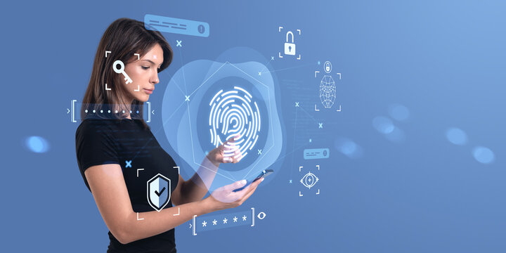Woman using smartphone with fingerprint scanning and biometric i