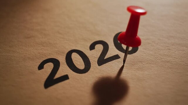 
number 2026 writing and pin