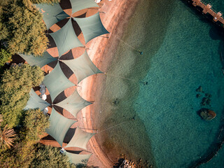 
Aerial View of the Shaded Beach Area at Dolphin Reef, Eilat, Israel &ndash; Red Sea Coastline

