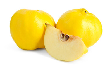 Whole and cut ripe quince fruits isolated on white
