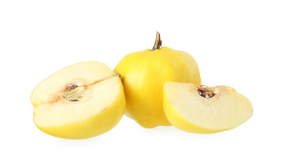 Whole and cut ripe quince fruits isolated on white