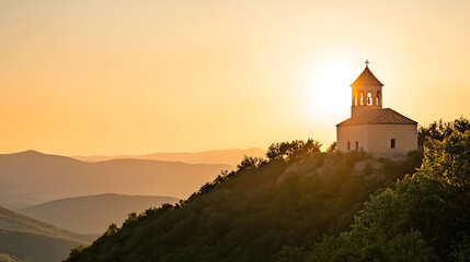 Sunset bathes a hilltop chapel in golden light, casting long shadows over rolling hills. A serene, spiritual landscape evoking peace, history, and timeless beauty.