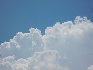 Beautiful White Puffy Clouds and Summer Sky