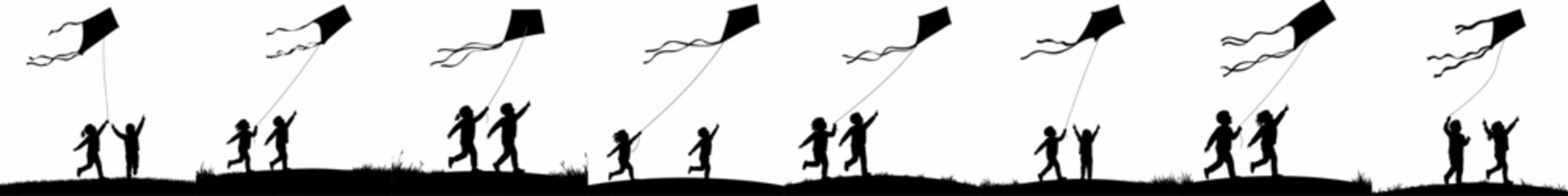 Black silhouette collection of children flying kites on a grassy hill, symbolizing carefree childhood and outdoor leisure activity. © Nadya
