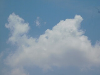 Beautiful White Puffy Clouds and Summer Sky