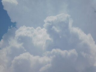 Beautiful White Puffy Clouds and Summer Sky