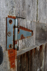 worn gate hinge