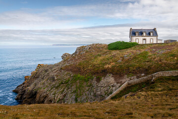 The Pointe du Millier Lighthouse (Maison Phare), near the village of Beuzec-Cap-Sizun, in Finist&egrave;re, Brittany, France.