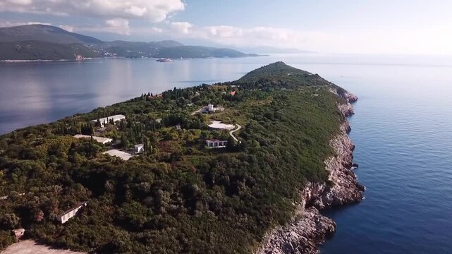 Middle part of Prevlaka peninsula, Croatia, with Montenegro in background, drone shot