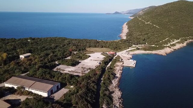 Northern part of Prevlaka peninsula, camper vans, lost place, Croatia, drone clip