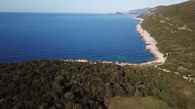Drone overflying the rocky coastline of Prevlaka, Croatia
