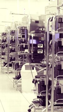 Vertical footage of workers in a Semiconductor manufacturing facility