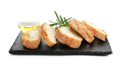Slices of ciabatta, oil and rosemary isolated on white