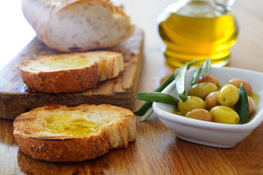 Olive oil, olives and bread