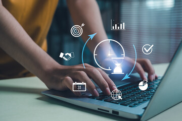 Business person using laptop for time management and productivity planning. Concept of project...