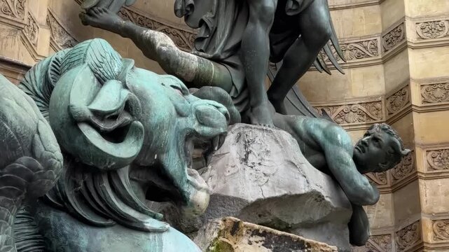 close-up of Fontaine Saint-Michel, Michael statue and green winged dragon.