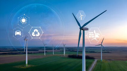 Renewable energy wind farm field at sunset with futuristic digital interface icons symbolizing sustainable development.