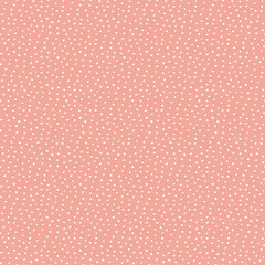 Coral pink background with scattered small white dots pattern texture