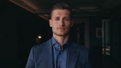 A handsome man in a suit, embodying confidence and a professional demeanor. The image exudes sophistication and style Stock Video