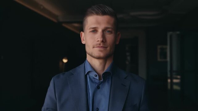 A handsome man in a suit, embodying confidence and a professional demeanor. The image exudes sophistication and style Stock Video