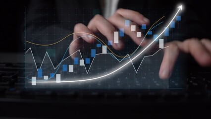 Close-up of hands typing on a keyboard with overlaid digital charts displaying financial data, showcasing investment trends and performance analysis. Copula