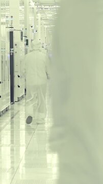 Vertical footage of workers in a Semiconductor manufacturing facility