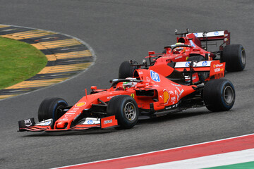 Naklejka premium Scarperia; Italy - October 24th 2025: Ferrari SF90 ex Sebastian Vettel and Charles Leclerc in action during Ferrari World Finals 2025 at Mugello Circuit in Italy.