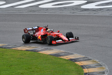 Naklejka premium Scarperia; Italy - October 24th 2025: Ferrari SF1000 ex Sebastian Vettel and Charles Leclerc in action during Ferrari World Finals 2025 at Mugello Circuit in Italy.