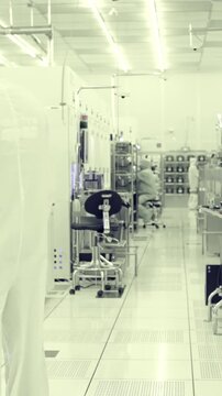 Vertical footage of workers in a Semiconductor manufacturing facility