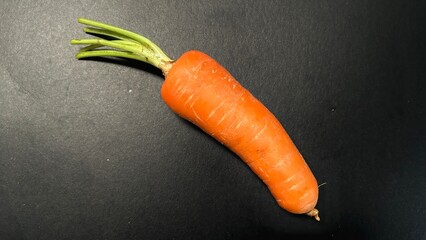 Fresh Carrot on Black Background