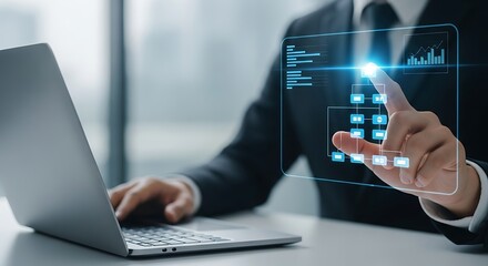 Businessman interacting with futuristic digital interface and data analytics on screen