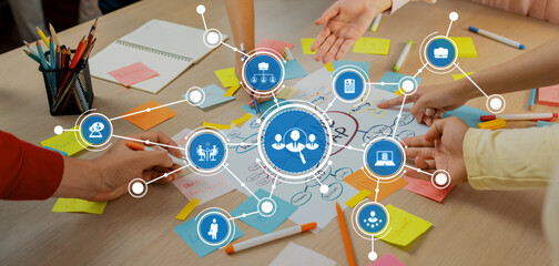 A vibrant scene of teamwork in a creative workshop, showcasing hands actively engaging with...