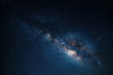 Fototapeta premium Captivating night sky view filled with twinkling stars, vibrant constellations, and the stunning Milky Way, enhancing the serene beauty of the cosmos with enchanting hues of purple and blue