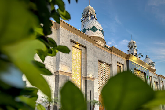 Beautiful modern mosque exterior with domes and Islamic architecture in Tabanan, Bali, Indonesia